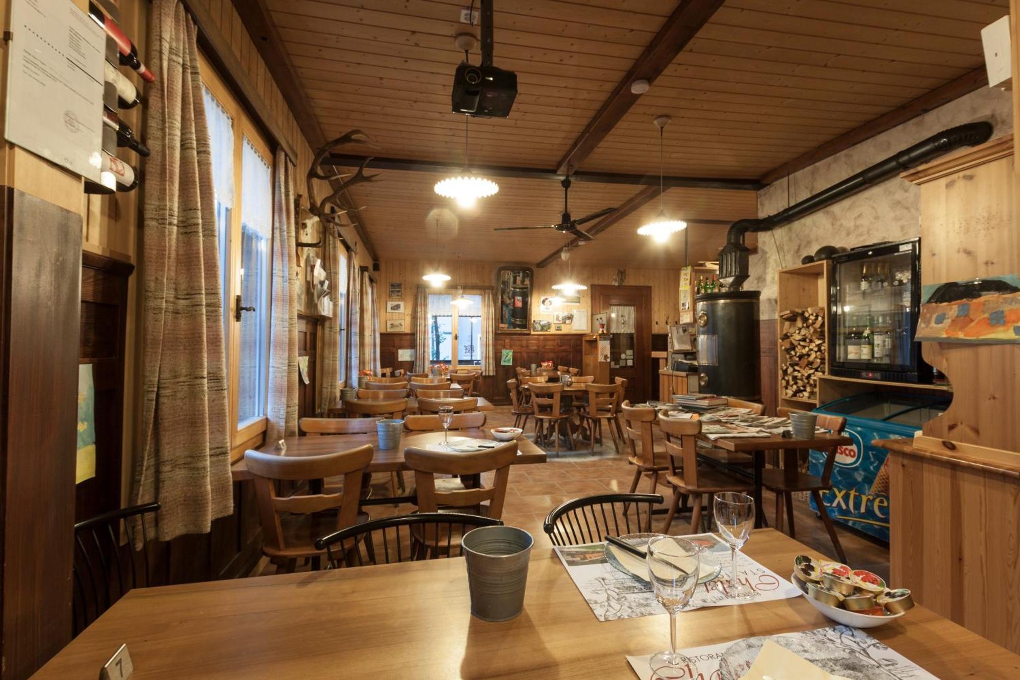 Ristorante Pensione Chalet Stazione พอสเชียโว ภายนอก รูปภาพ